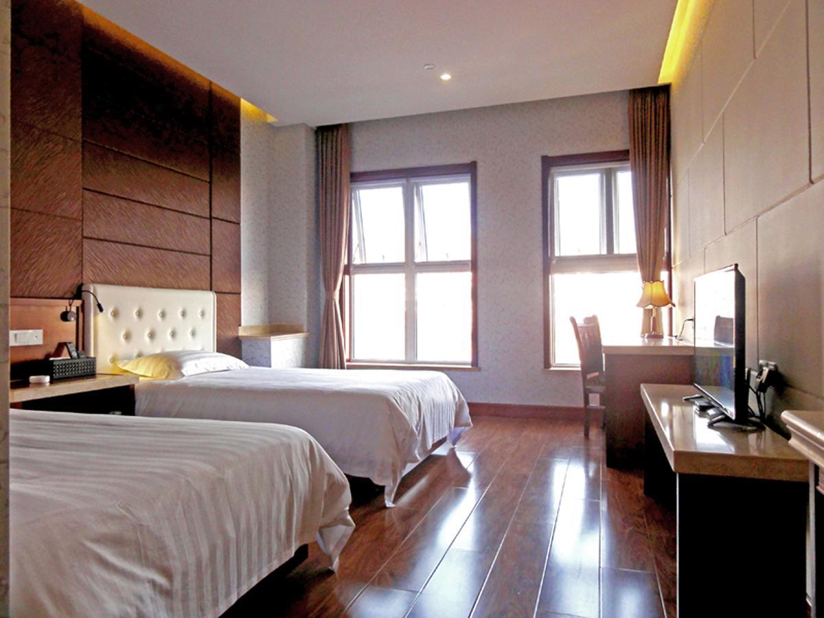 Hua Qi Kaiserdom Hotel Zhongshan Road St Michael'S Cathedral And Zhanqiao Pier تشينغداو المظهر الخارجي الصورة