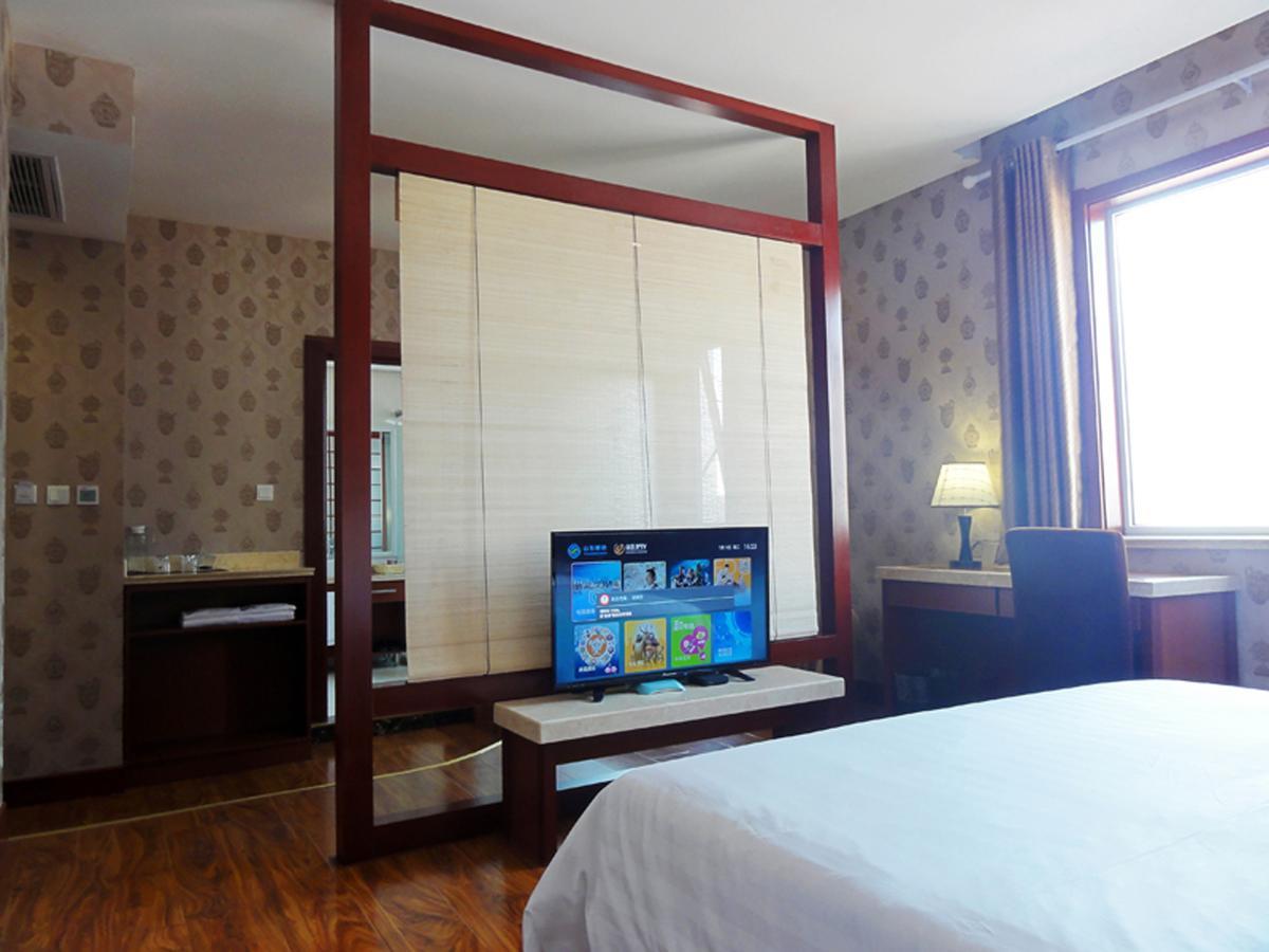 Hua Qi Kaiserdom Hotel Zhongshan Road St Michael'S Cathedral And Zhanqiao Pier تشينغداو المظهر الخارجي الصورة